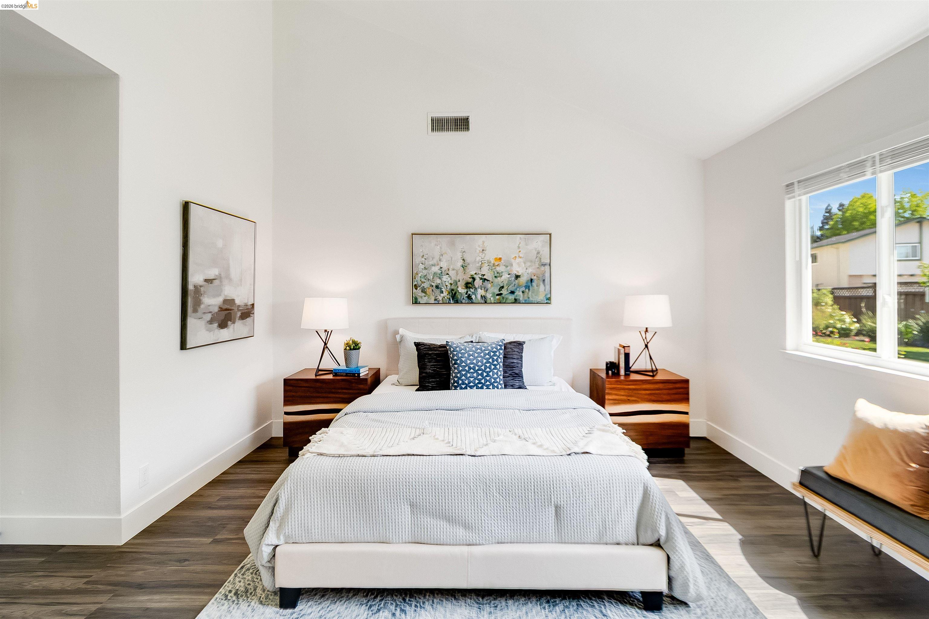 9980 Mangos Drive San Ramon, CA 94583 - Photo 18 of 41 Bedroom featuring vaulted ceiling and dark wood-type flooring