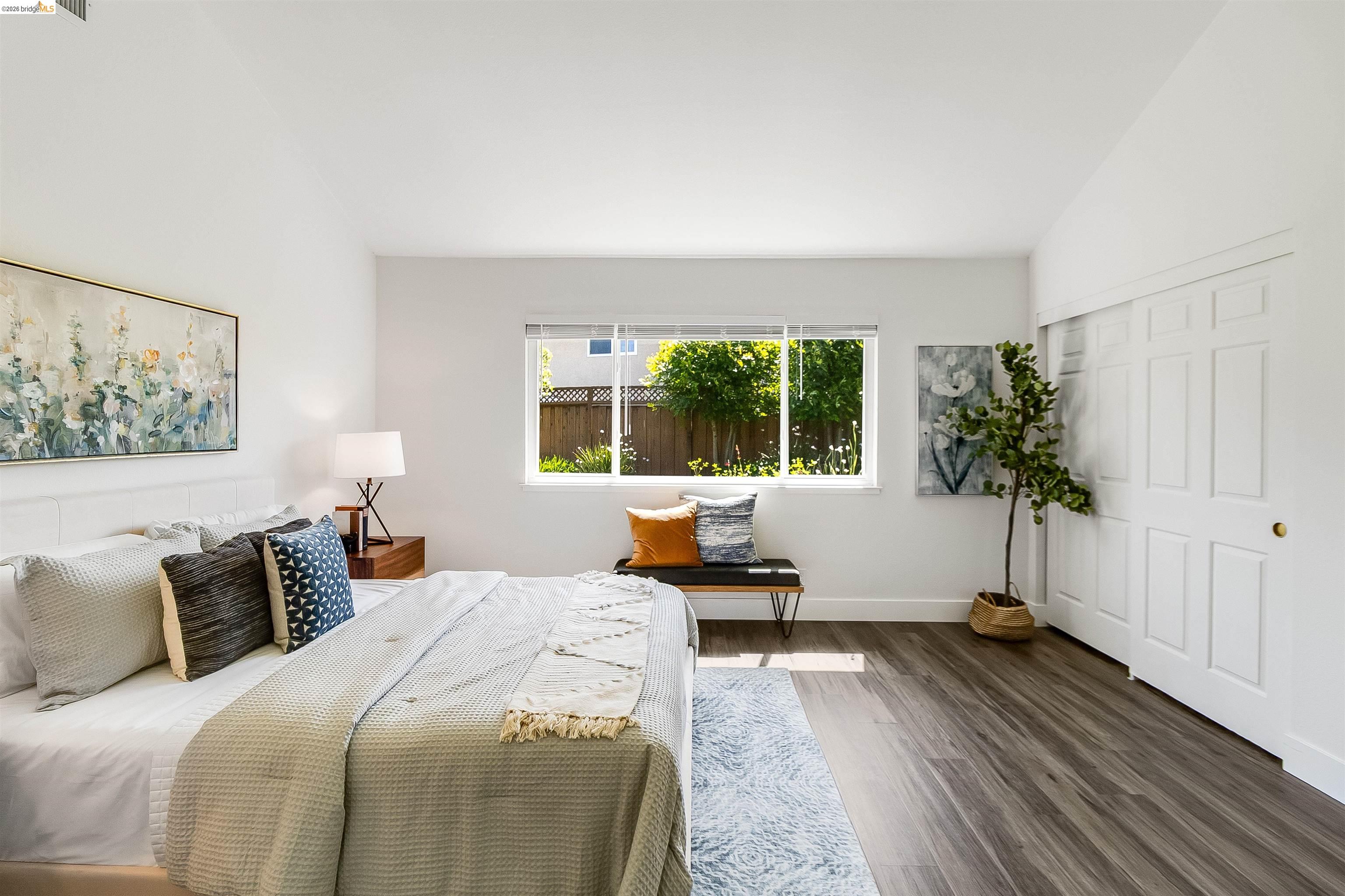 9980 Mangos Drive San Ramon, CA 94583 - Photo 19 of 41 Bedroom with vaulted ceiling, dark wood-style floors, and a closet