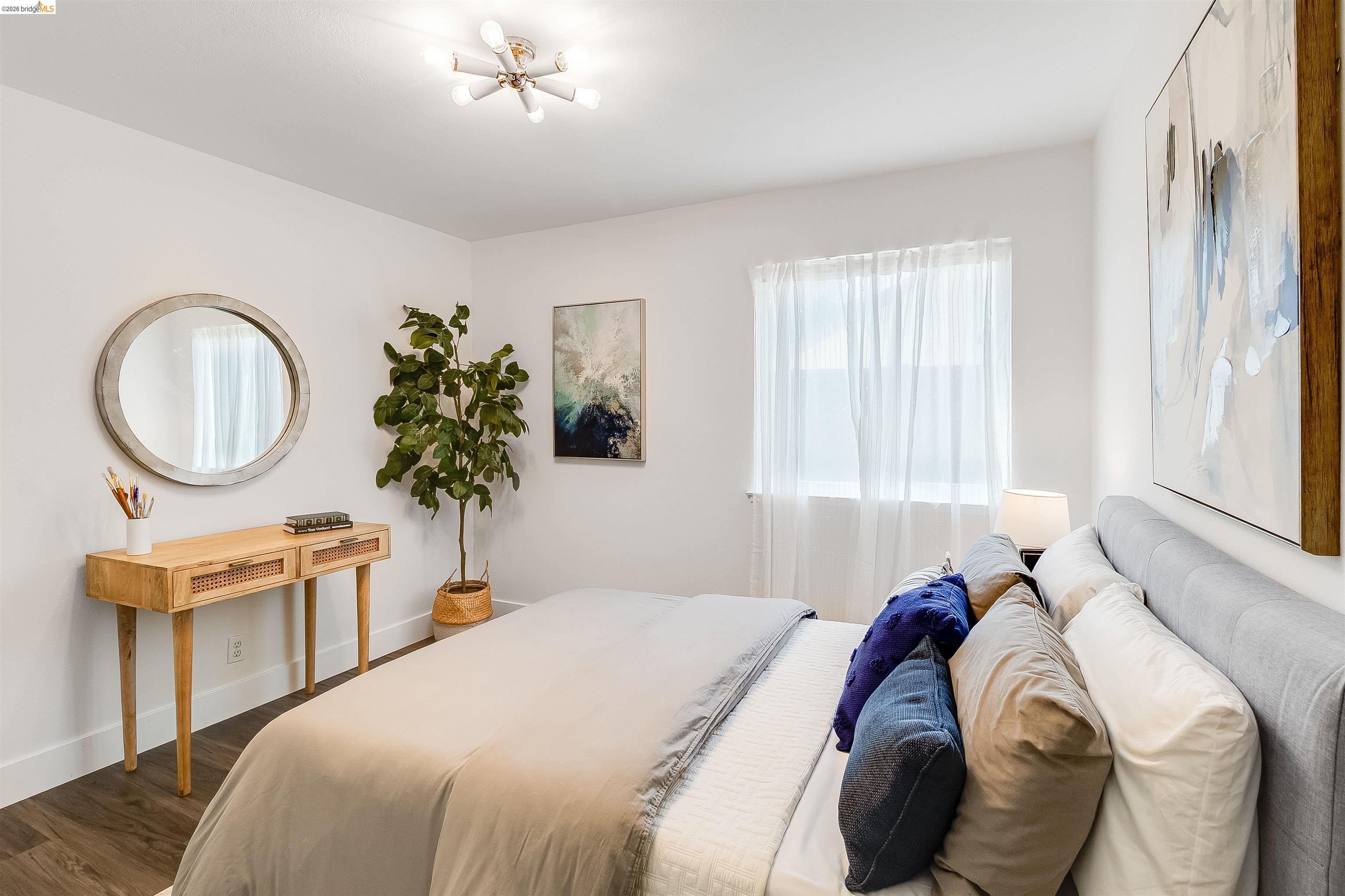 9980 Mangos Drive San Ramon, CA 94583 - Photo 27 of 41 Bedroom with wood finished floors and baseboards