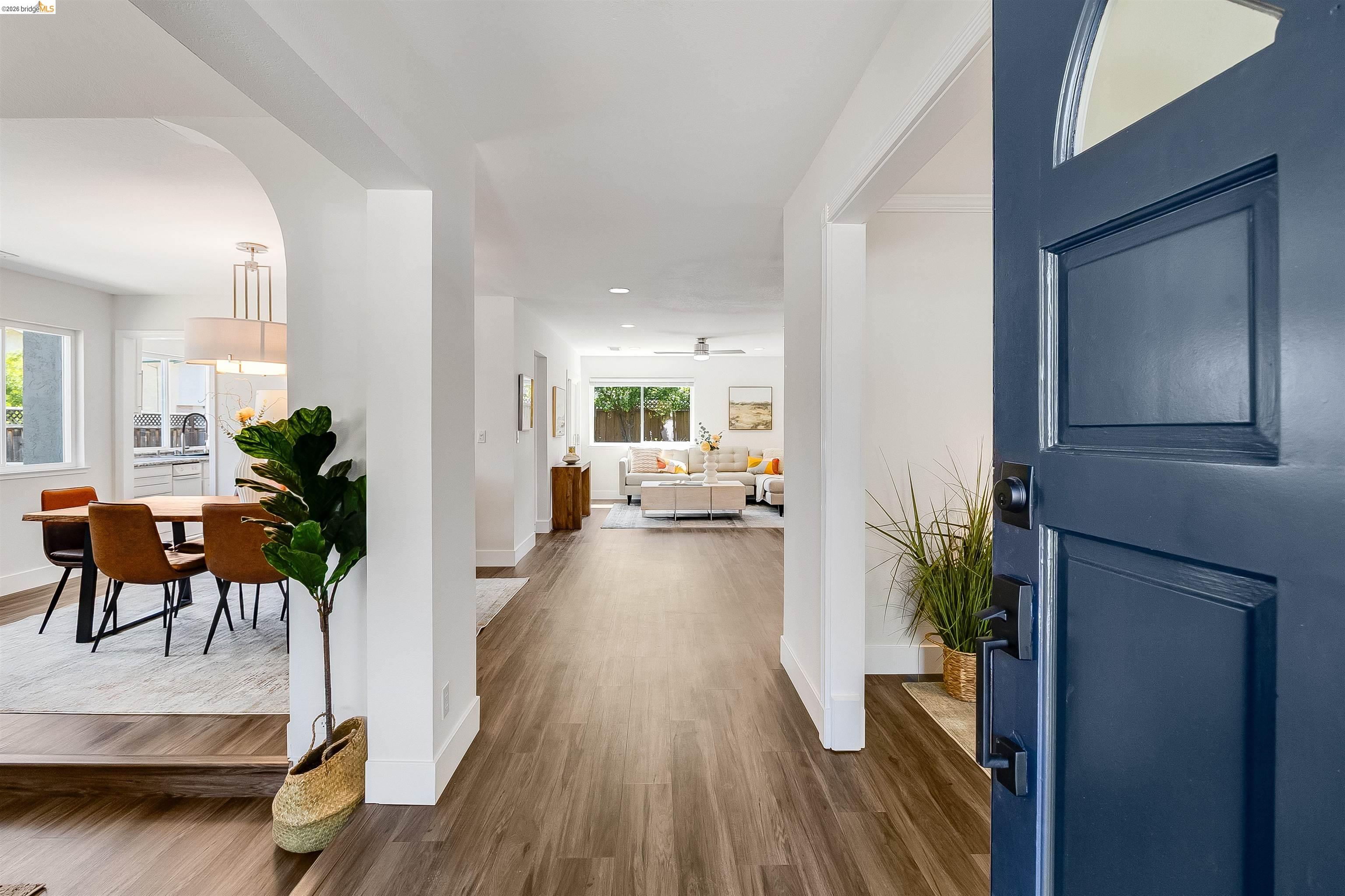 9980 Mangos Drive San Ramon, CA 94583 - Photo 4 of 41 Foyer with dark wood-style flooring, arched walkways, recessed lighting, and ceiling fan