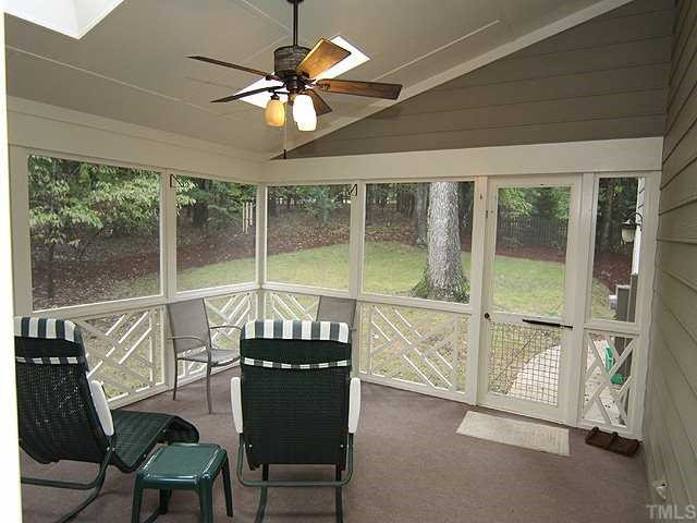 9000 Enfield Court Raleigh, NC 27615 - Photo 15 of 18 Relax and enjoy the serenity of the view from the screened porch with a vaulted ceiling and skylights to let the light shine in. Screened Porch