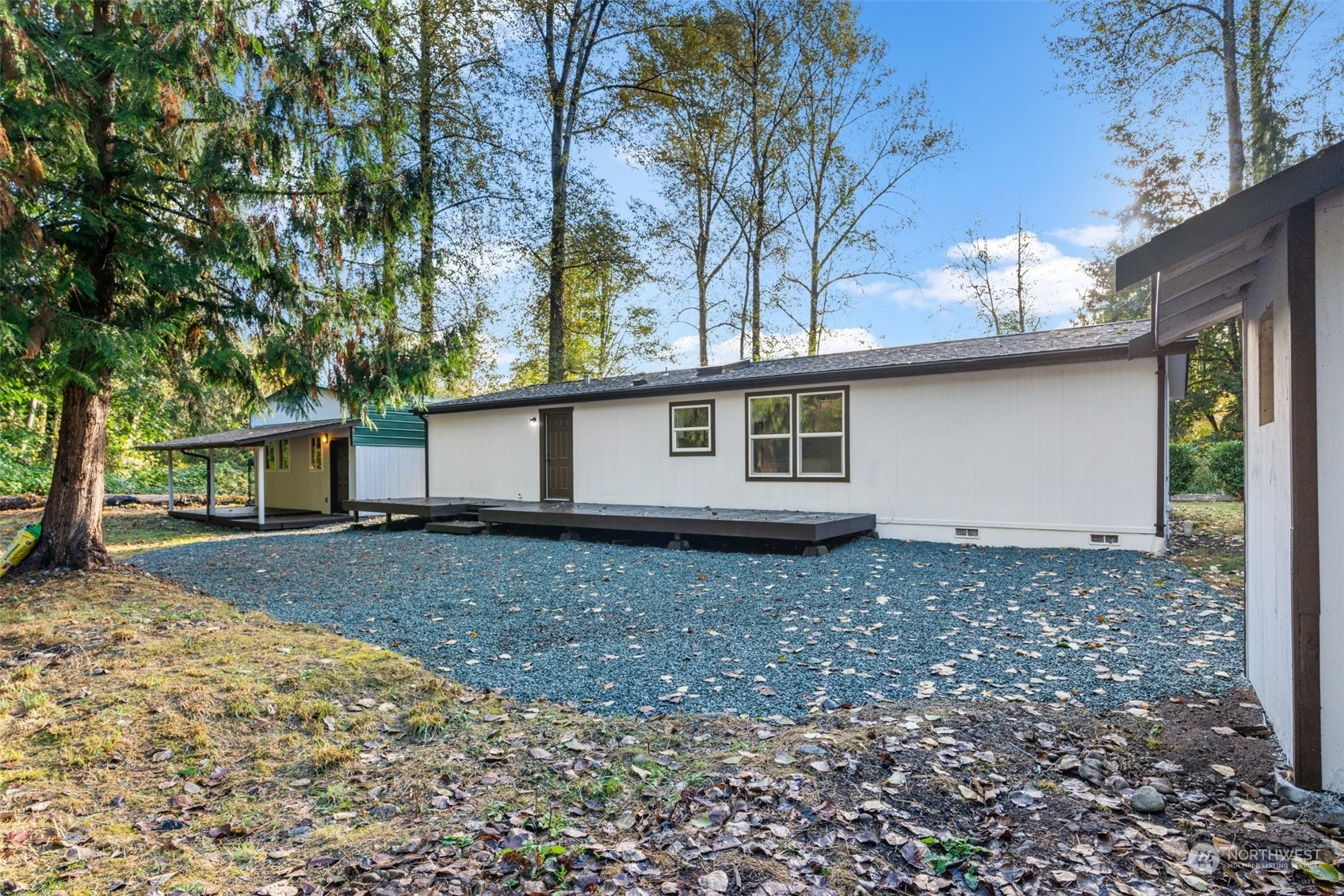 13314 Spring Site Road East Orting, WA 98360 - Photo 26 of 28 a view of a house with a yard