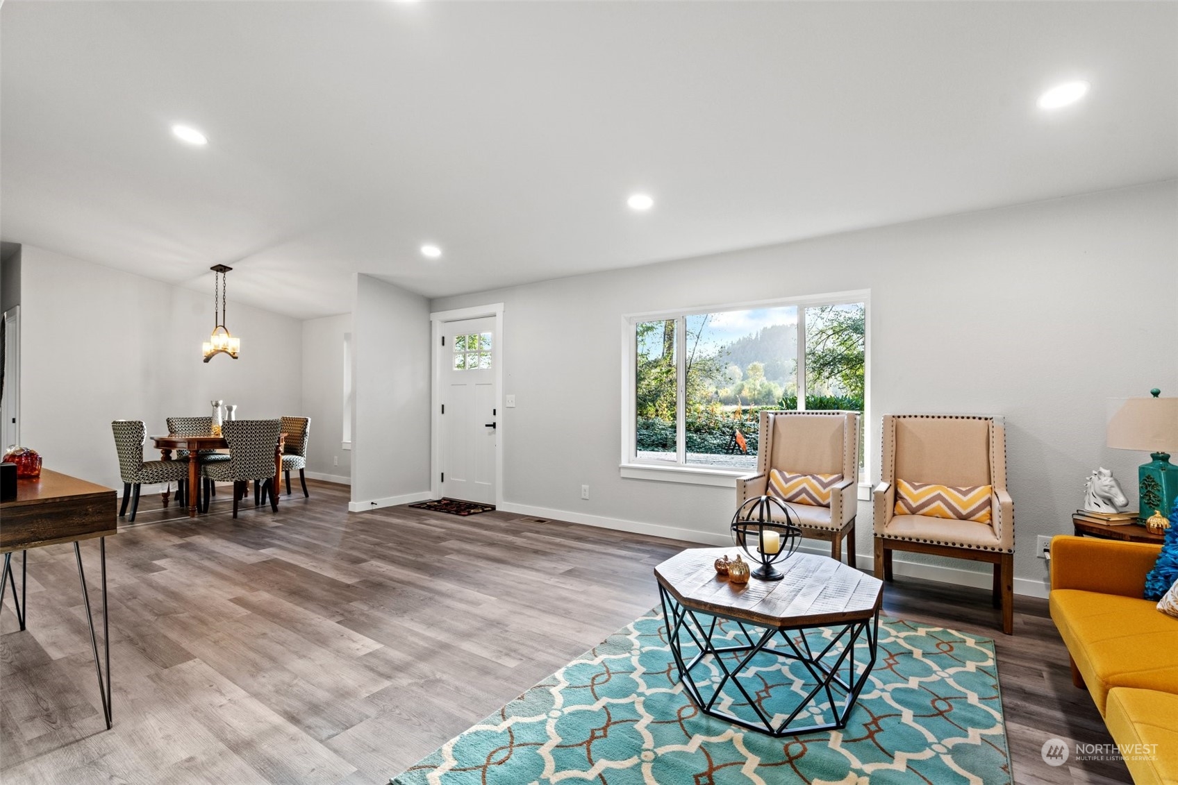 13314 Spring Site Road East Orting, WA 98360 - Photo 6 of 28 a living room with furniture and a large window