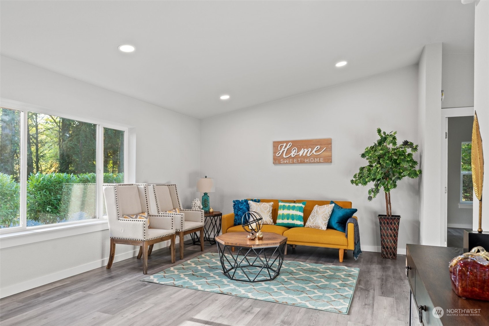 13314 Spring Site Road East Orting, WA 98360 - Photo 7 of 28 a living room with furniture and a large window