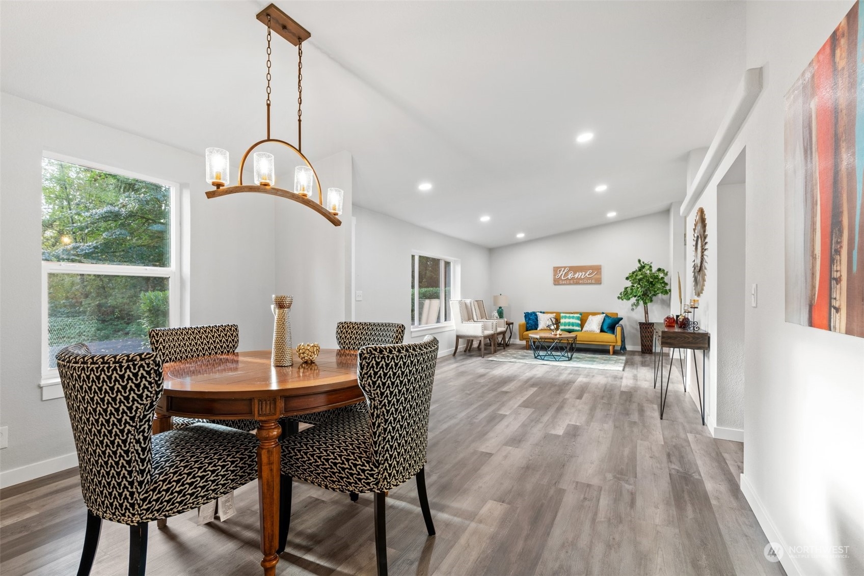 13314 Spring Site Road East Orting, WA 98360 - Photo 9 of 28 a view of a dining room with furniture window and wooden floor