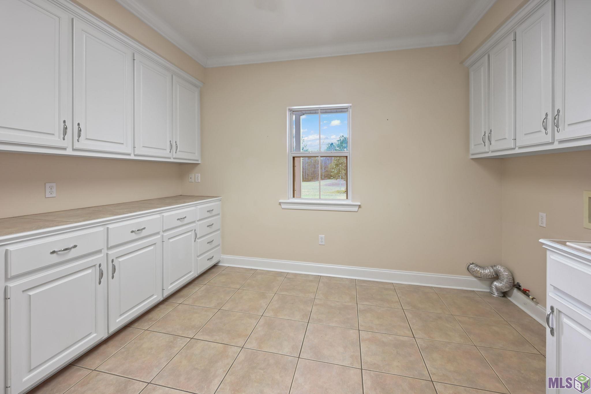 16010 Peairs Road Pride, LA 70770 - Photo 25 of 35 Oversized Laundry Room