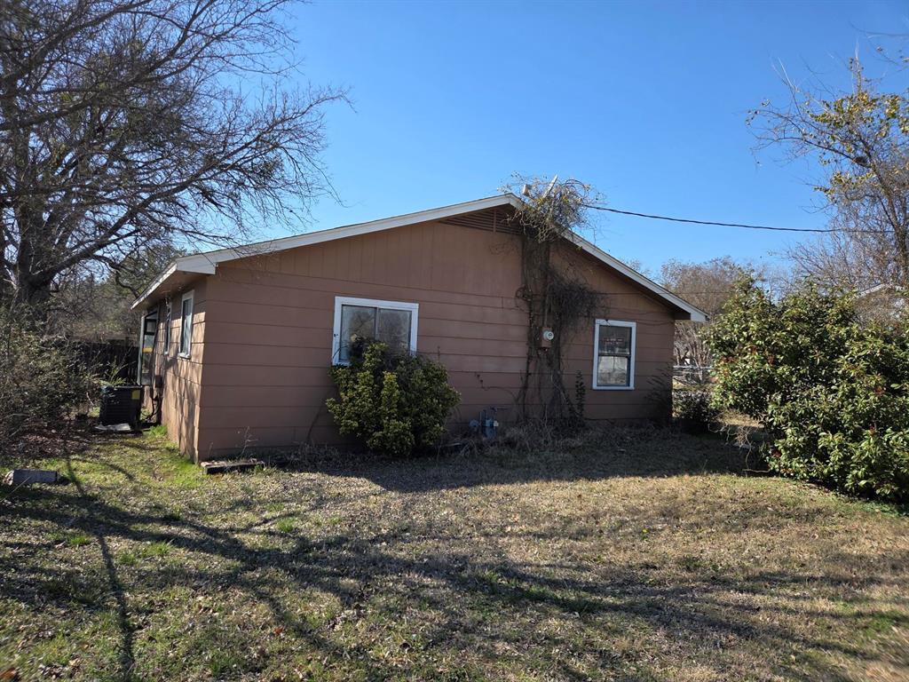 105 Royal Lane Princeton, TX 75407 - Photo 3 of 14 a front view of house with yard and trees around