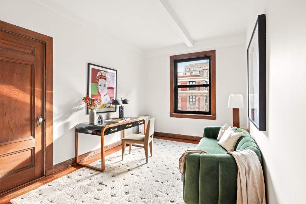 257 West 86th Street, Unit 78B Manhattan, NY 10024 - Photo 6 of 14 a living room with furniture and a window