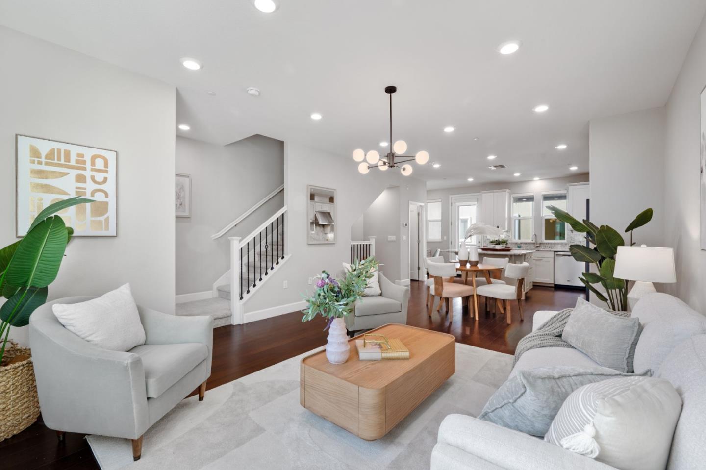 5977 Larkstone Loop San Jose, CA 95123 - Photo 1 of 63 a living room with furniture kitchen view and a chandelier