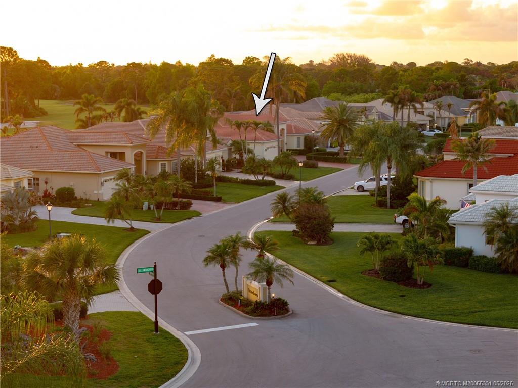 2216 Southeast Stonehaven Road Port St. Lucie, FL 34952 - Photo 52 of 67 an aerial view of a house with garden space and street view