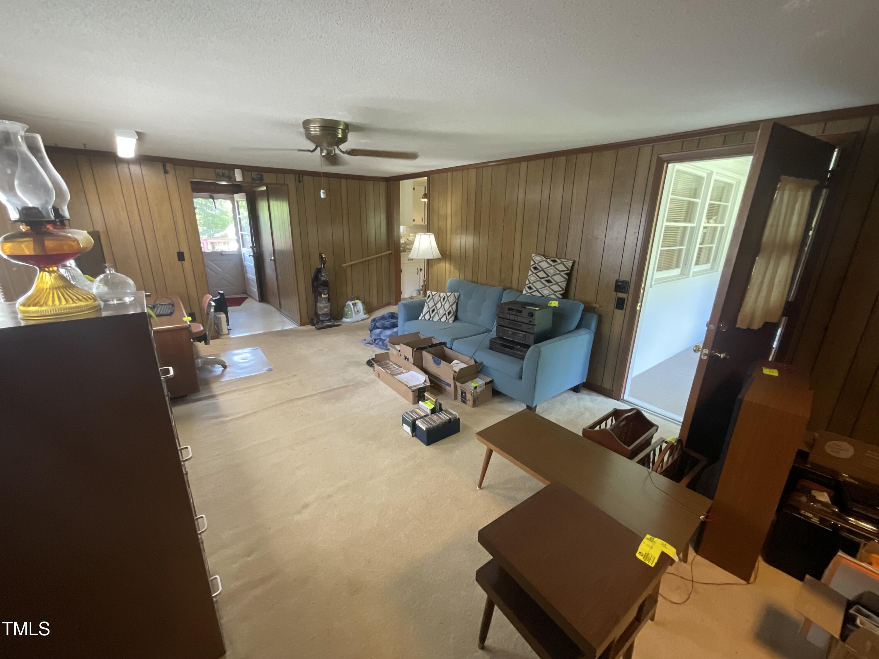 4540 Benson Road Angier, NC 27501 - Photo 11 of 27 a living room with furniture and a window