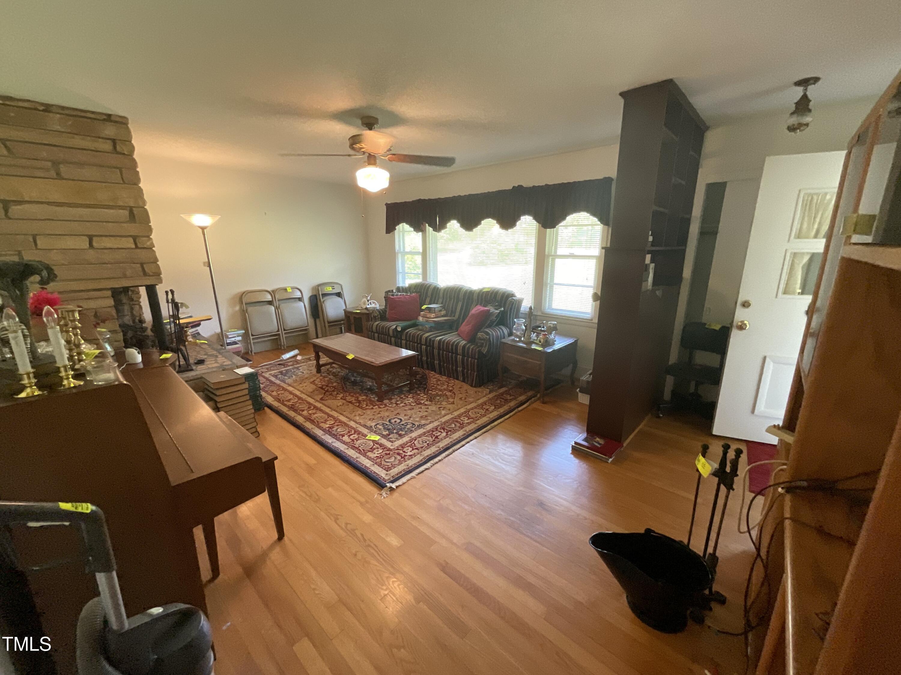4540 Benson Road Angier, NC 27501 - Photo 17 of 27 a living room with furniture and a large window