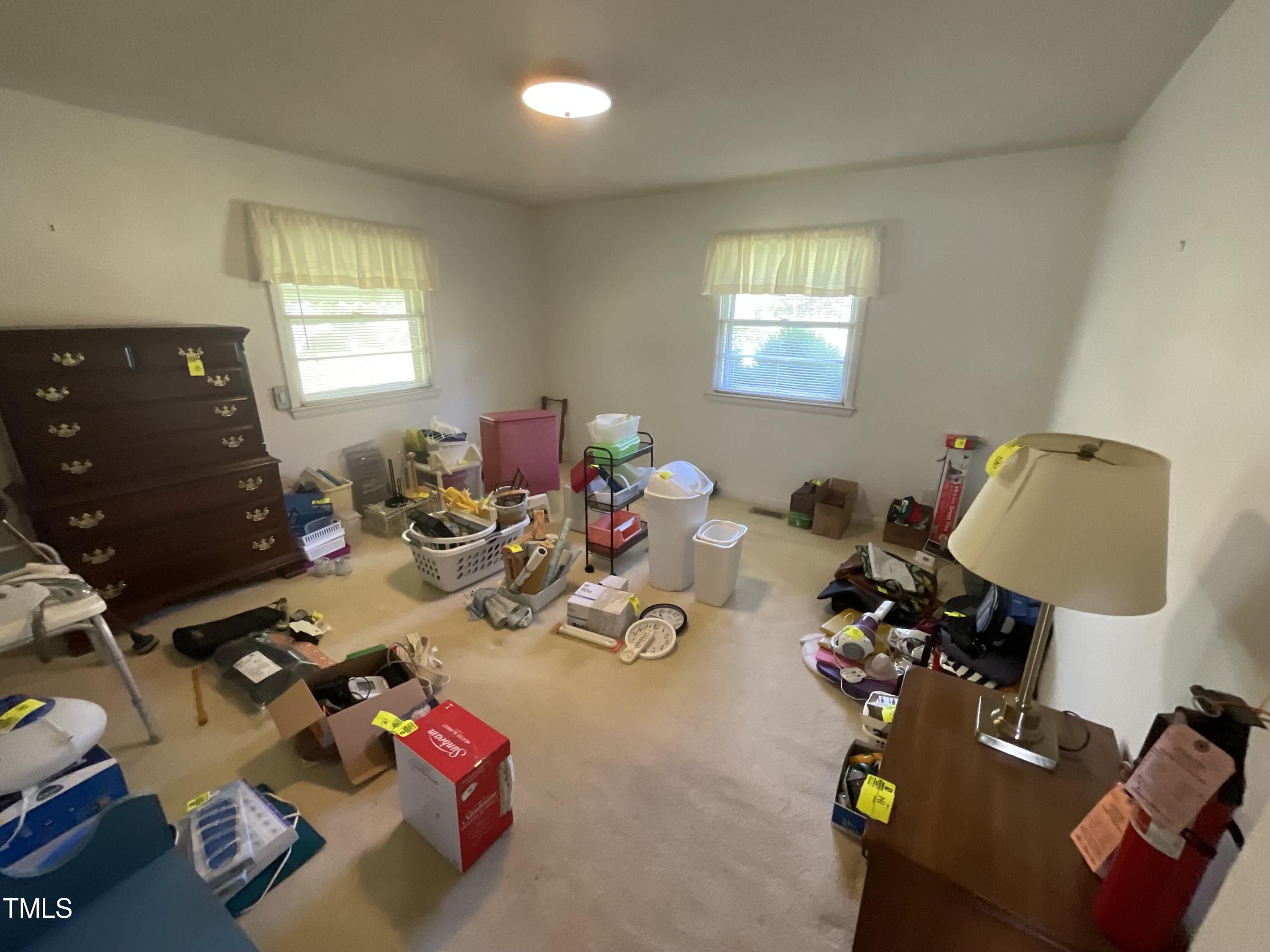 4540 Benson Road Angier, NC 27501 - Photo 26 of 27 a living room with furniture and a window