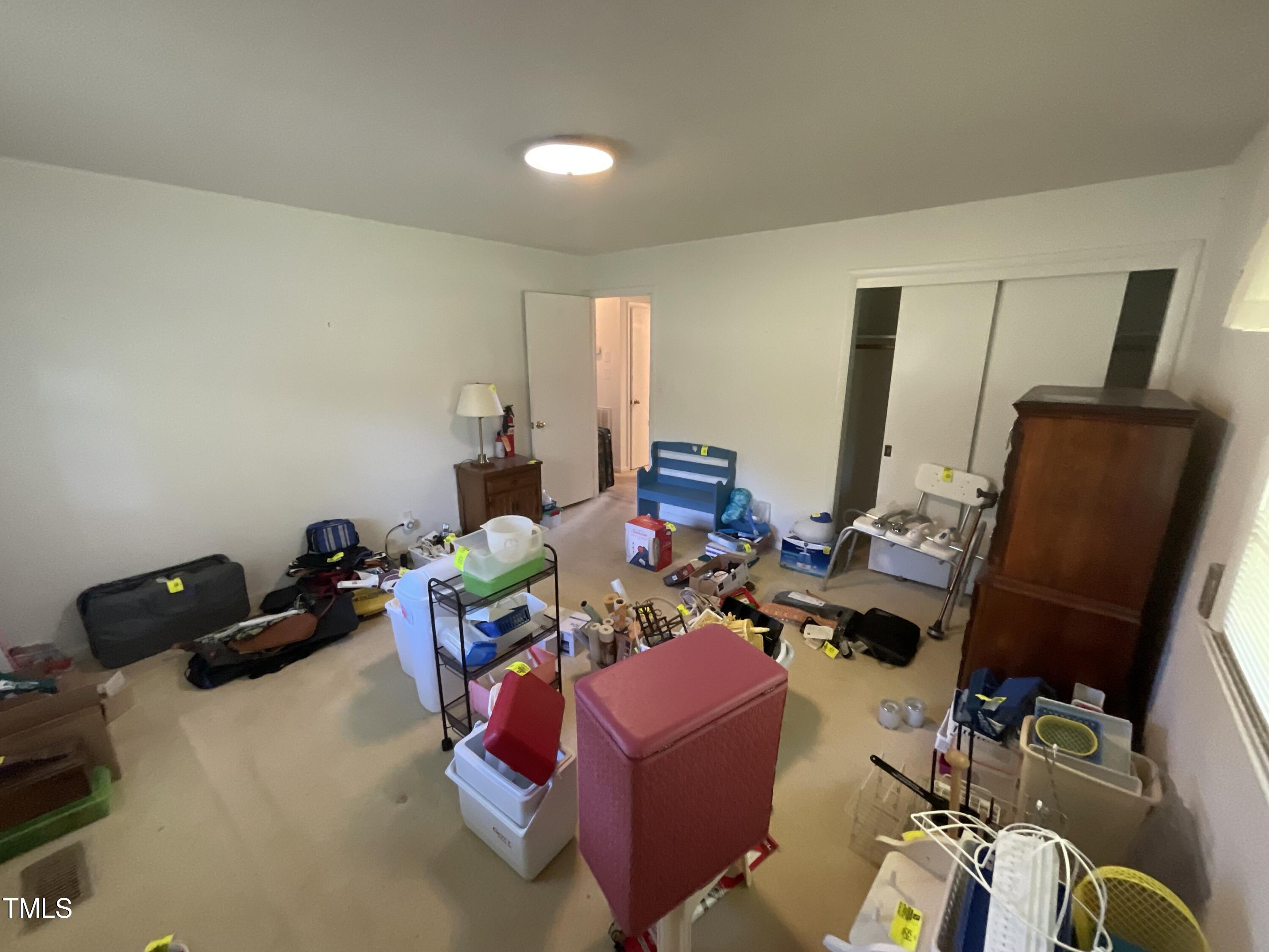 4540 Benson Road Angier, NC 27501 - Photo 27 of 27 a room with furniture and gym equipment