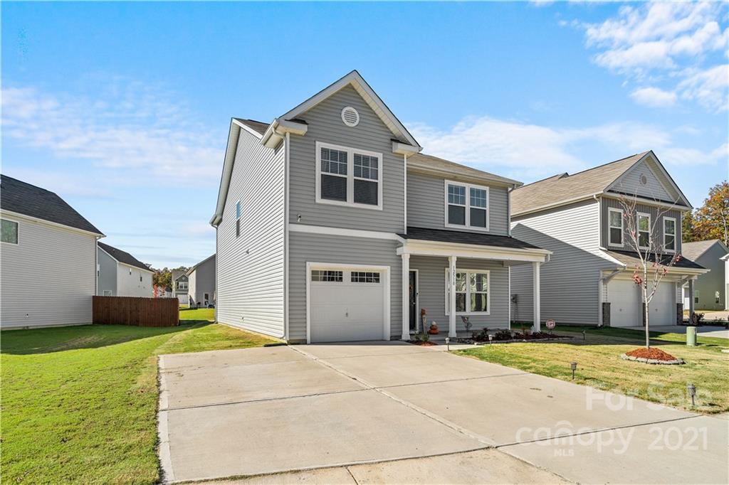 12510 Gotland Road Midland, NC 28107 - Photo 2 of 30 a front view of a house with a yard