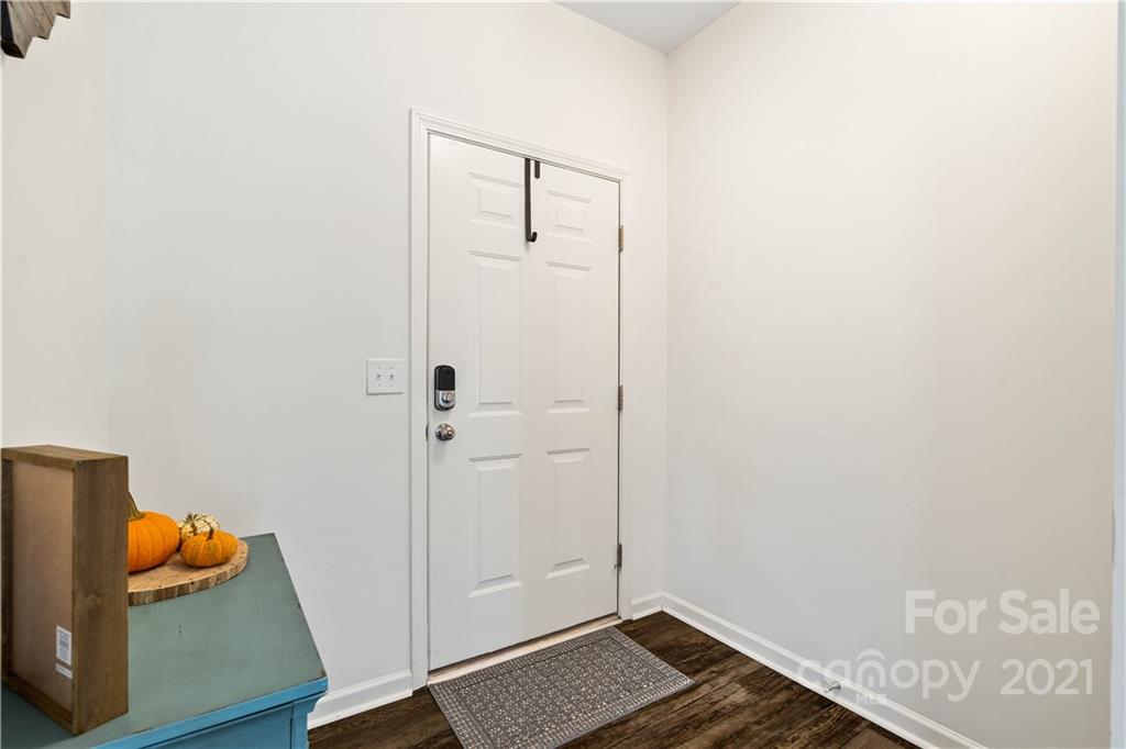 12510 Gotland Road Midland, NC 28107 - Photo 14 of 30 a view of room with hardwood floor and cabinet