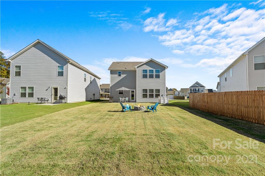 12510 Gotland Road Midland, NC 28107 - Photo 28 of 30 a view of a house with swimming pool and sitting area