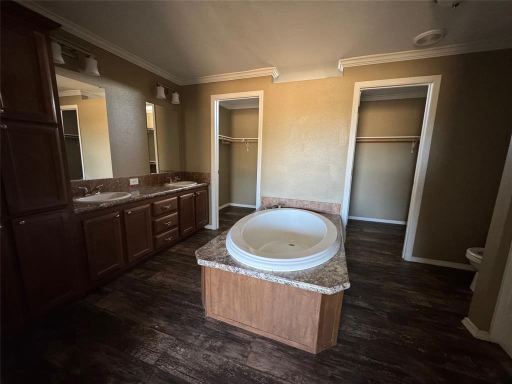 5481 Fm 1235 Merkel, TX 79536 - Photo 12 of 28 a large kitchen with a sink a refrigerator and a stove