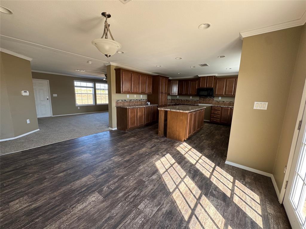 5481 Fm 1235 Merkel, TX 79536 - Photo 6 of 28 a kitchen with a sink and a refrigerator
