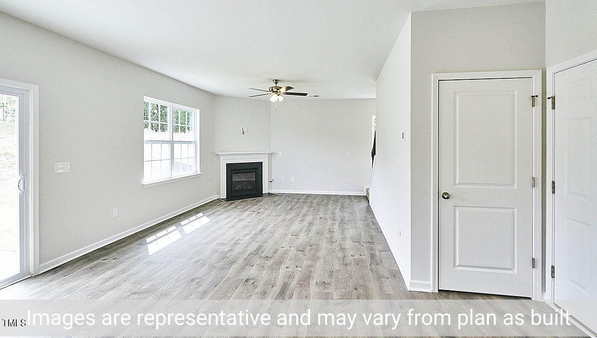 1702 Carter Daniel Drive Graham, NC 27253 - Photo 11 of 27 a view of an empty room with a window