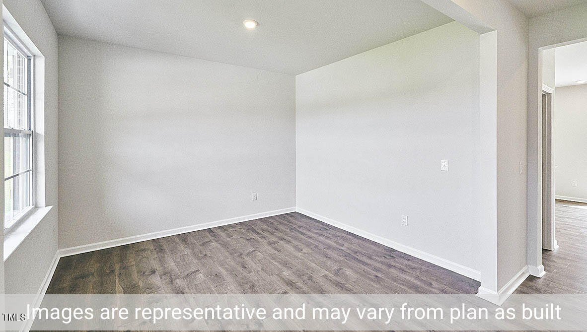 1702 Carter Daniel Drive Graham, NC 27253 - Photo 2 of 27 a view of an empty room