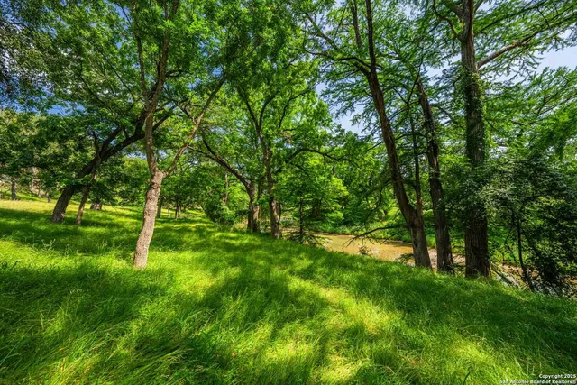 a view of outdoor space with deck and yard