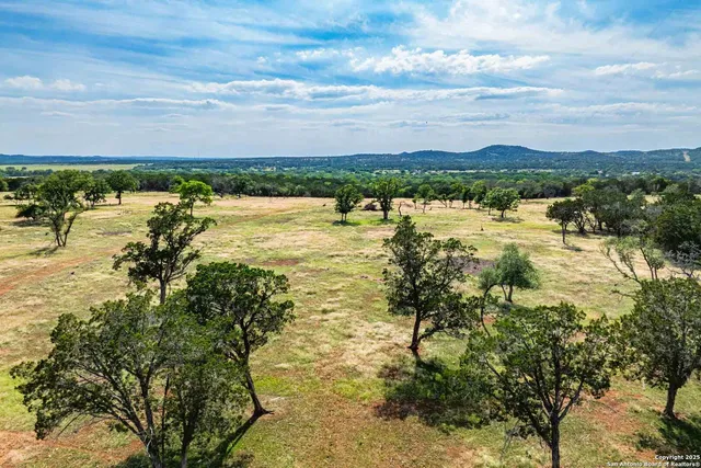 a view of a yard with an outdoor space
