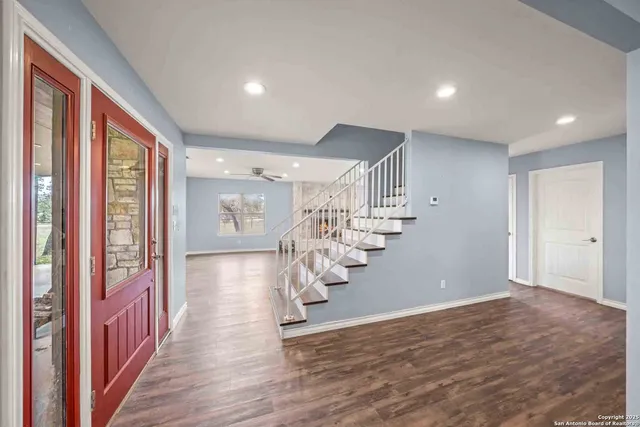a view of kitchen and kitchen with wooden floor