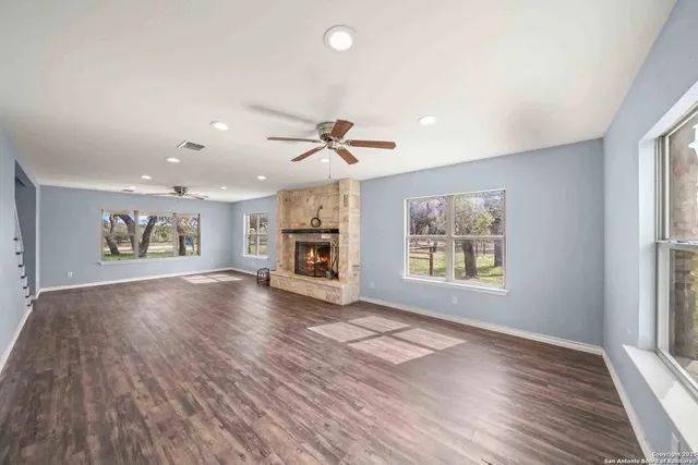a view of kitchen and kitchen with wooden floor