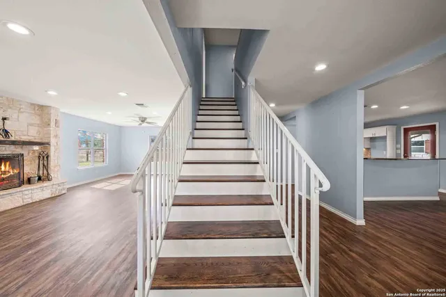 a bathroom with a sink and a window