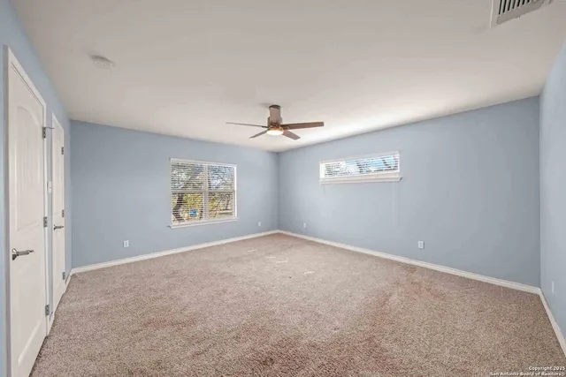 a view of a yard with an outdoor seating