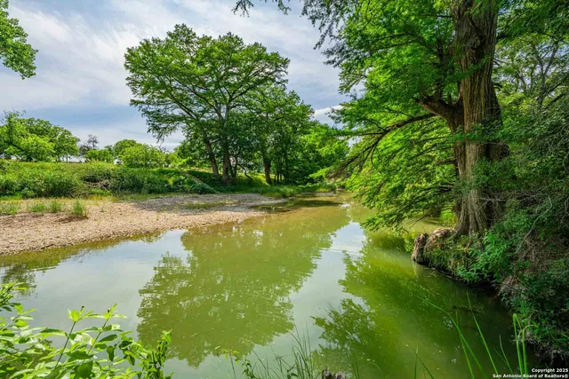 a view of a lake view with a garden