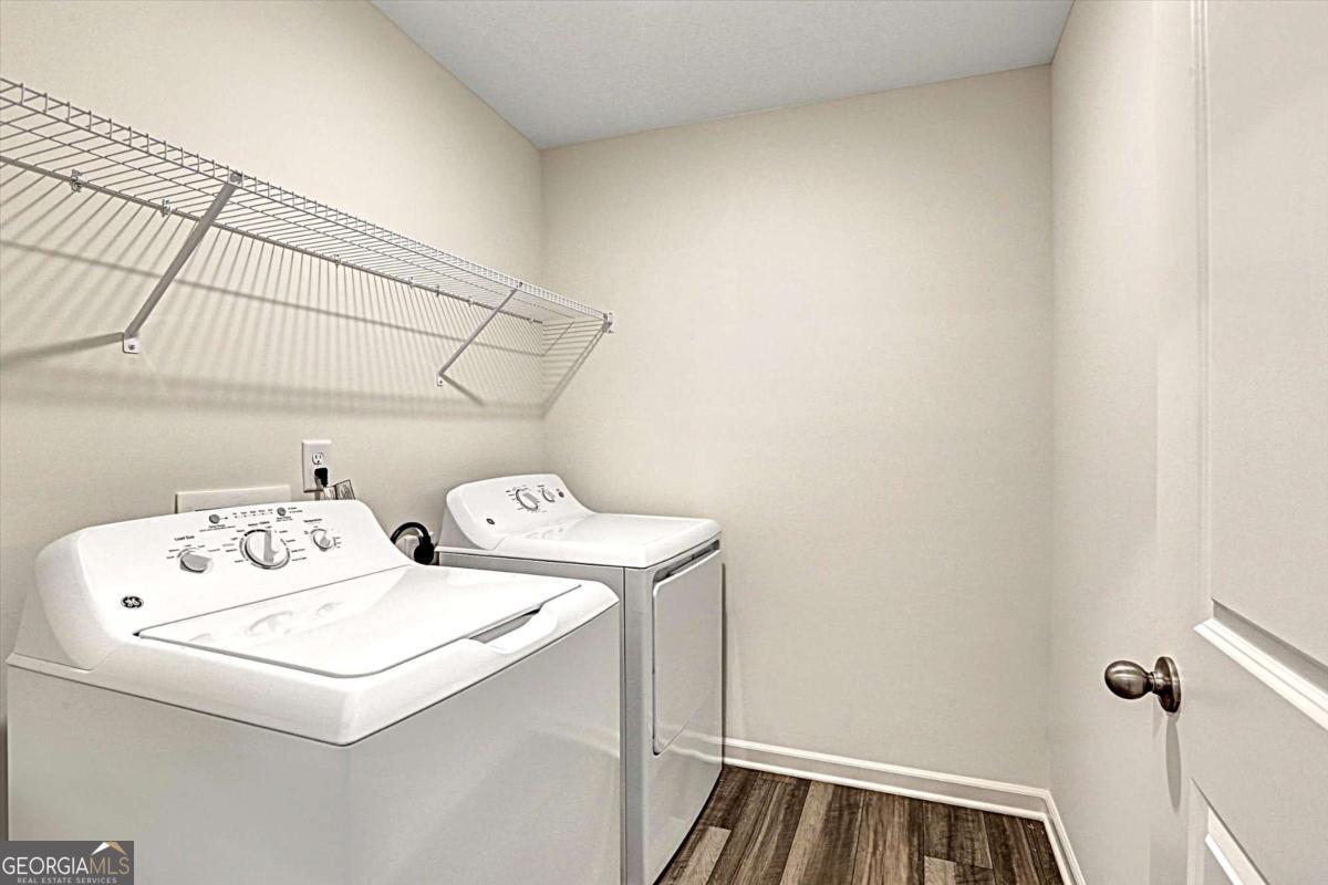 24 Rowlett Place Winder, GA 30680 - Photo 13 of 17 a utility room with dryer and washer