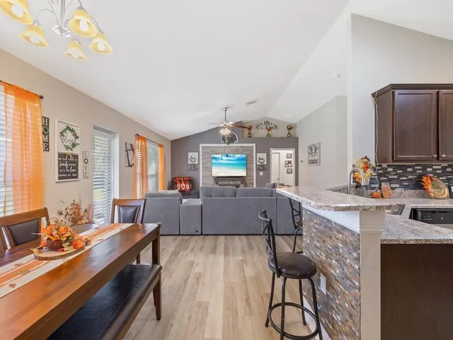 a living room with furniture and window