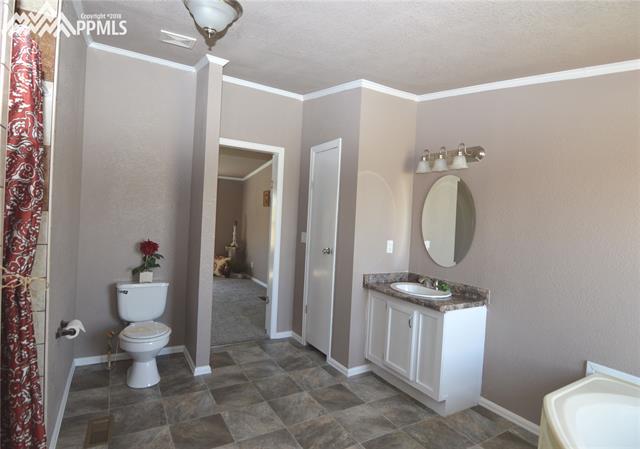 27055 Handle Road Calhan, CO 80808 - Photo 13 of 25 Another view of the master bathroom. A generous sized linen closet is included.