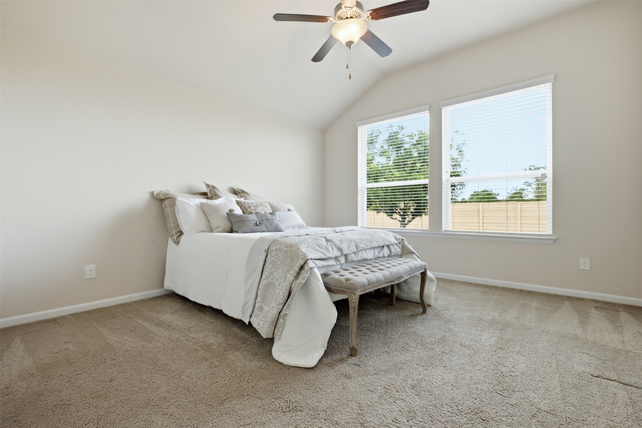 276 Gunnison Way Kyle, TX 78640 - Photo 11 of 28 a bedroom with bed and a window