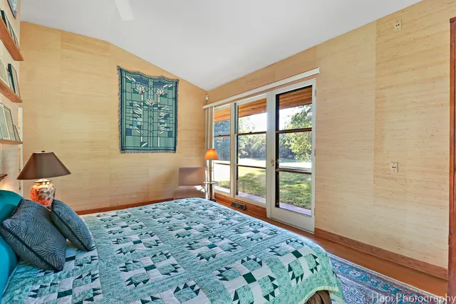 a bathroom with a double vanity sink mirror and shower