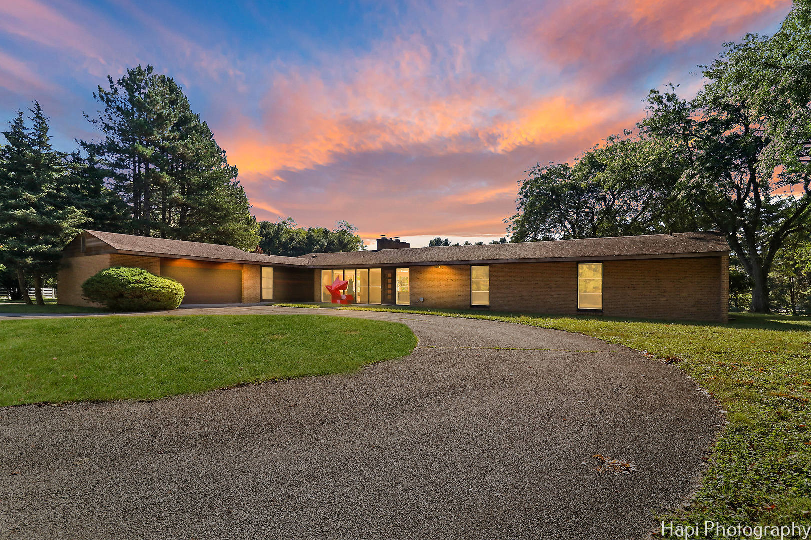 80 Meadow Hill Road Barrington Hills, IL 60010 - Photo 2 of 25 a front view of a house with a yard and a garage