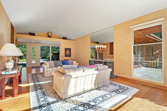 a living room with furniture and a rug