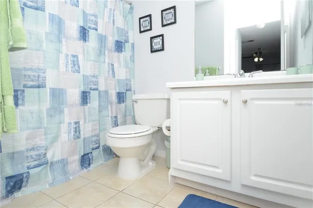 an aerial view of residential houses with outdoor space and river