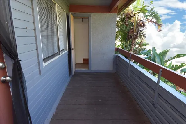 an aerial view of a house with outdoor space pool seating area and yard