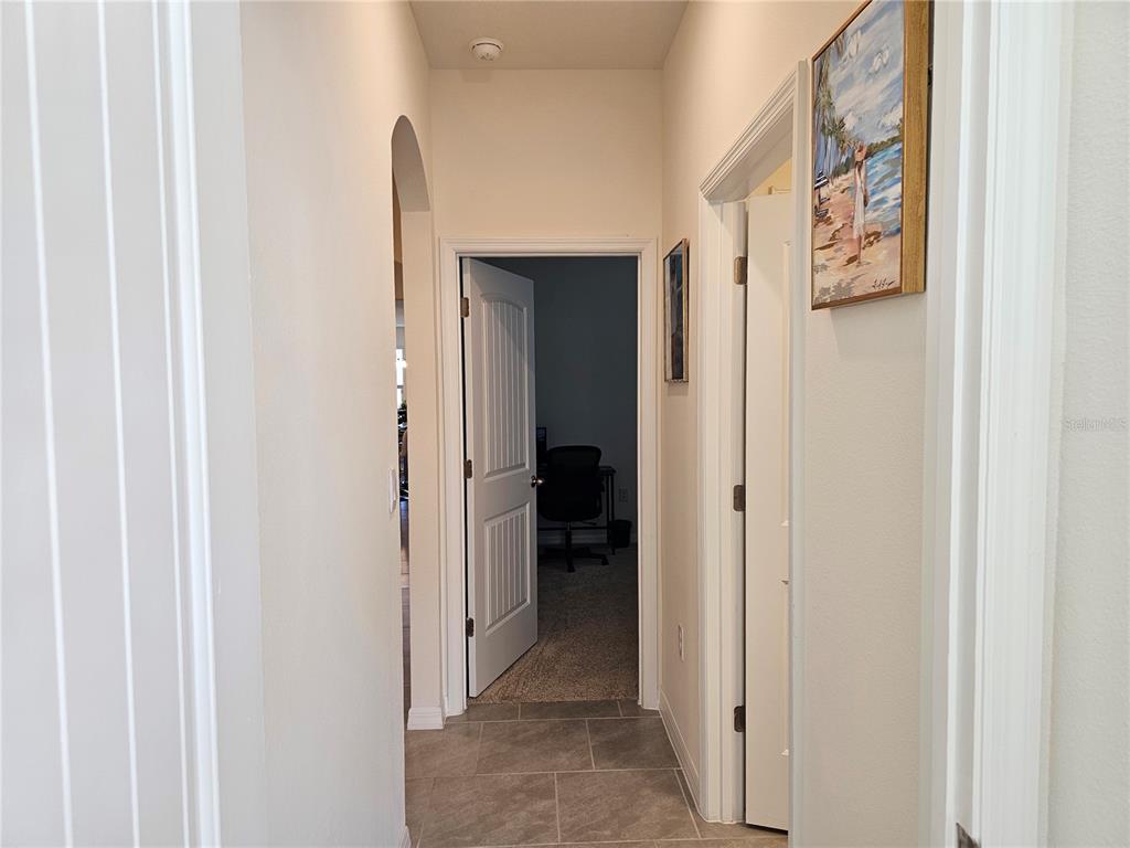 2045 Rankin Street Kissimmee, FL 34744 - Photo 15 of 38 a view of a hallway with closet and a bathroom