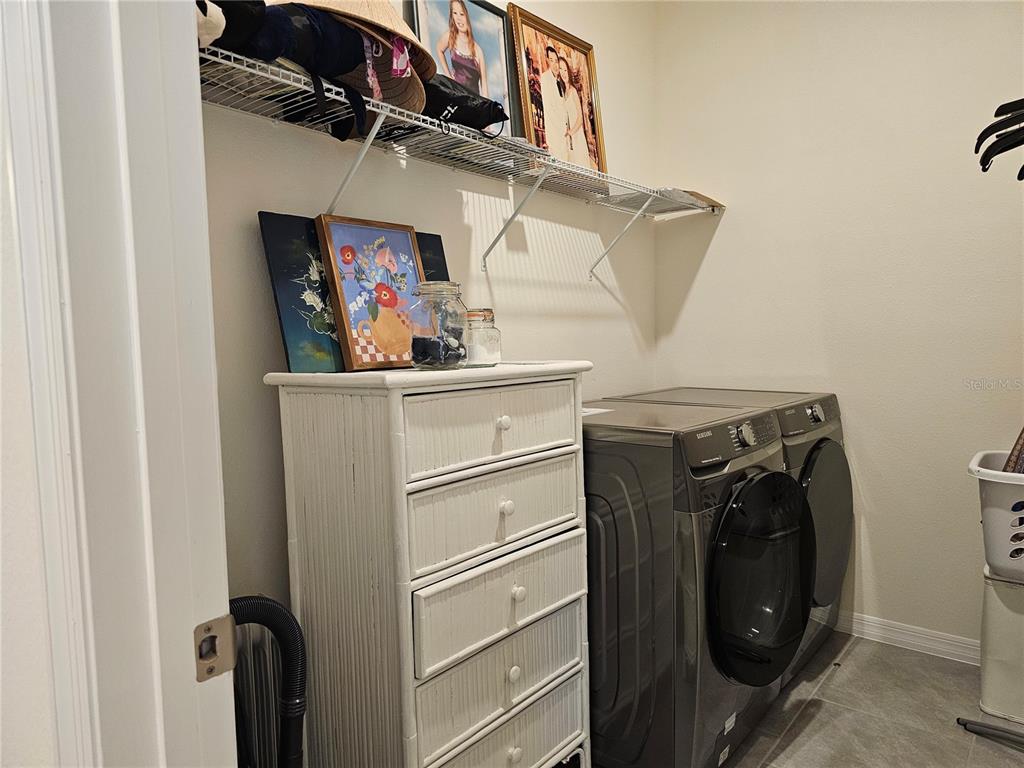 2045 Rankin Street Kissimmee, FL 34744 - Photo 23 of 38 a utility room with dryer and washer