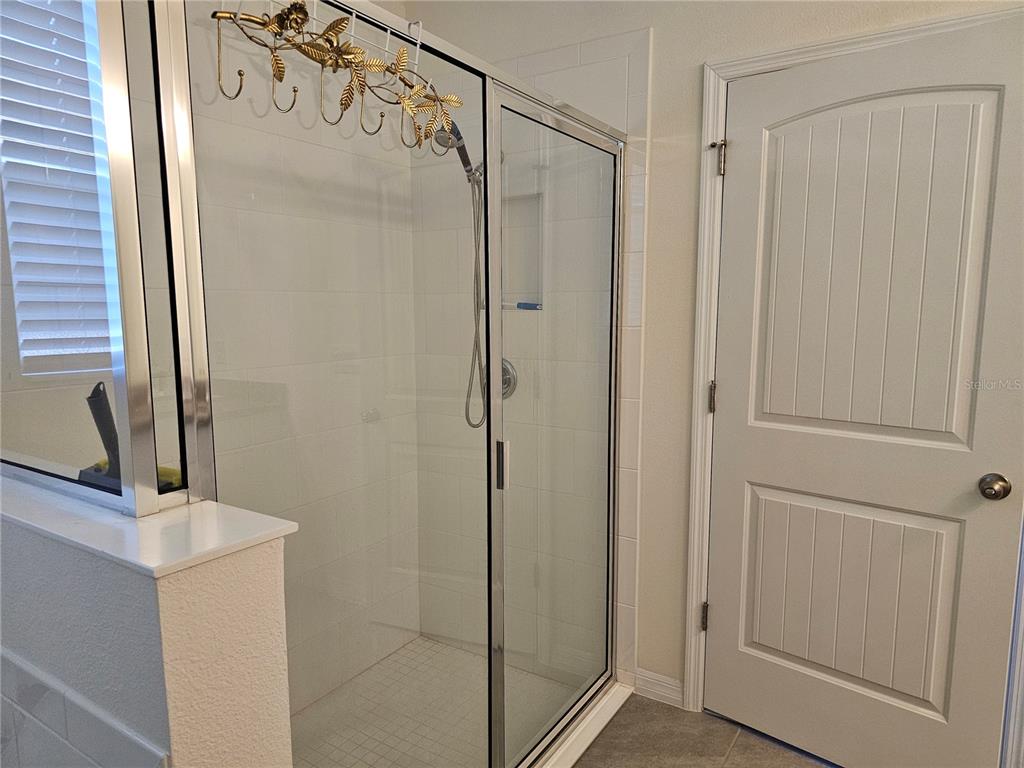 2045 Rankin Street Kissimmee, FL 34744 - Photo 30 of 38 a bathroom with a shower and a sink