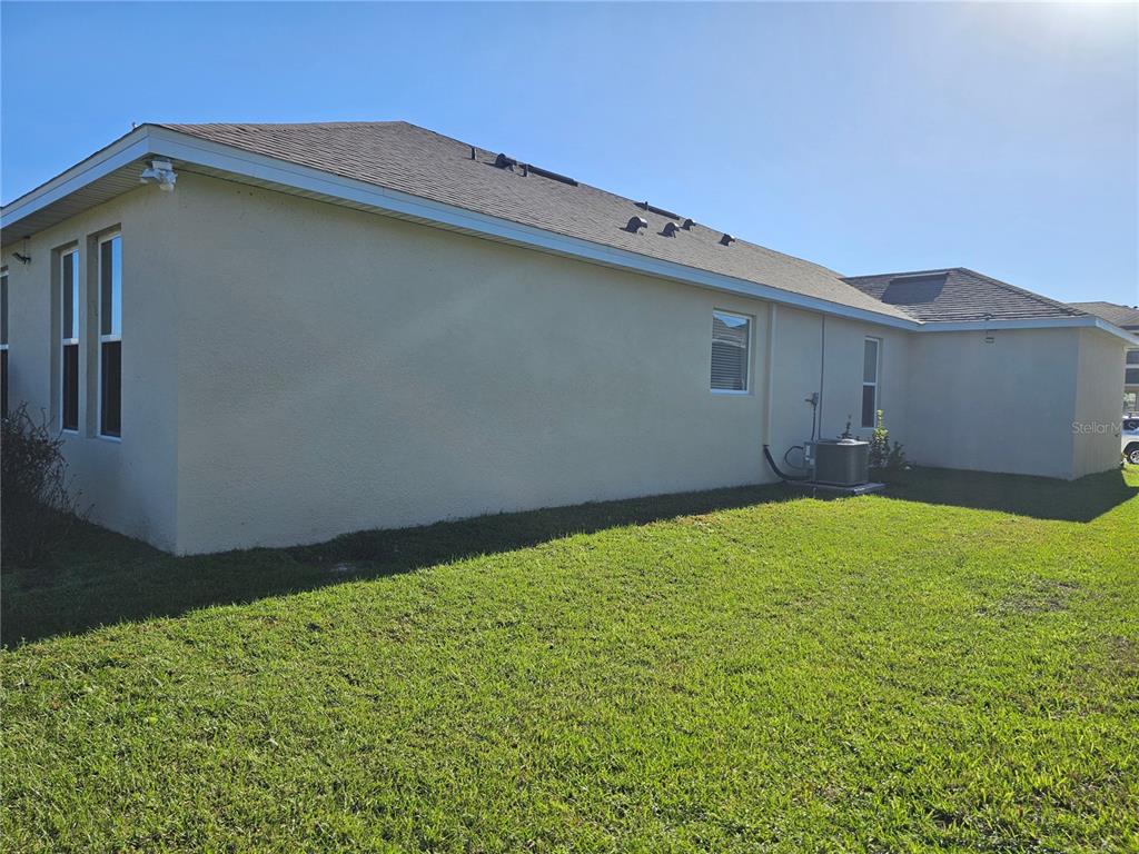 2045 Rankin Street Kissimmee, FL 34744 - Photo 36 of 38 a backyard of a house