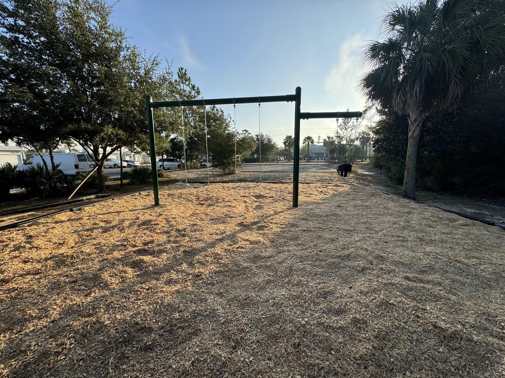 166 North Sand Palm Road Freeport, FL 32439 - Photo 19 of 22 a view of a backyard