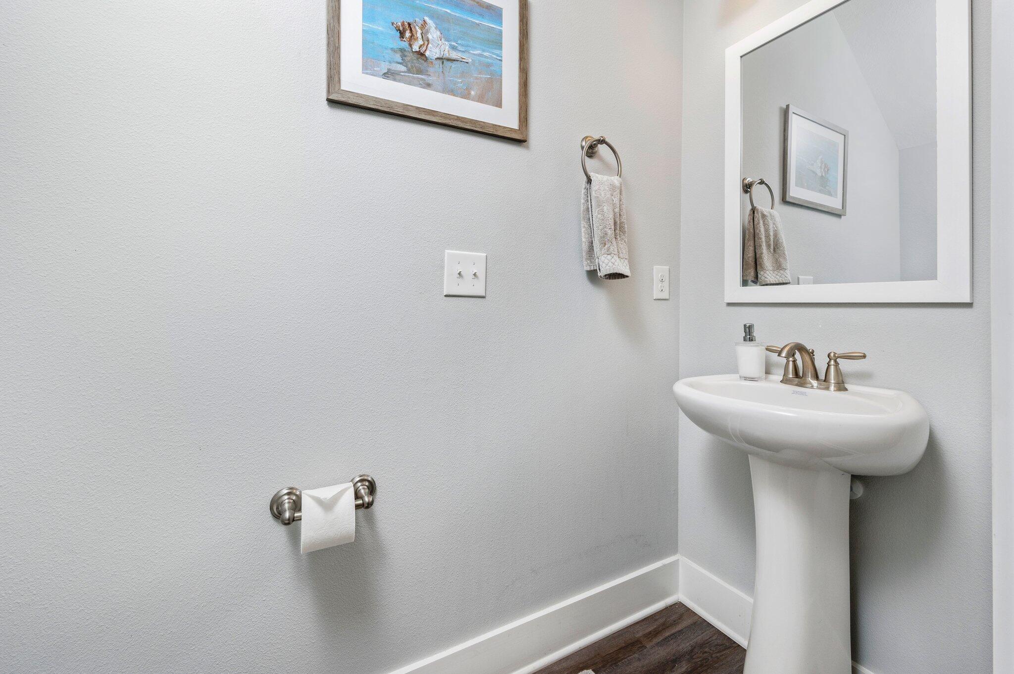 166 North Sand Palm Road Freeport, FL 32439 - Photo 4 of 22 a bathroom with a sink and mirror