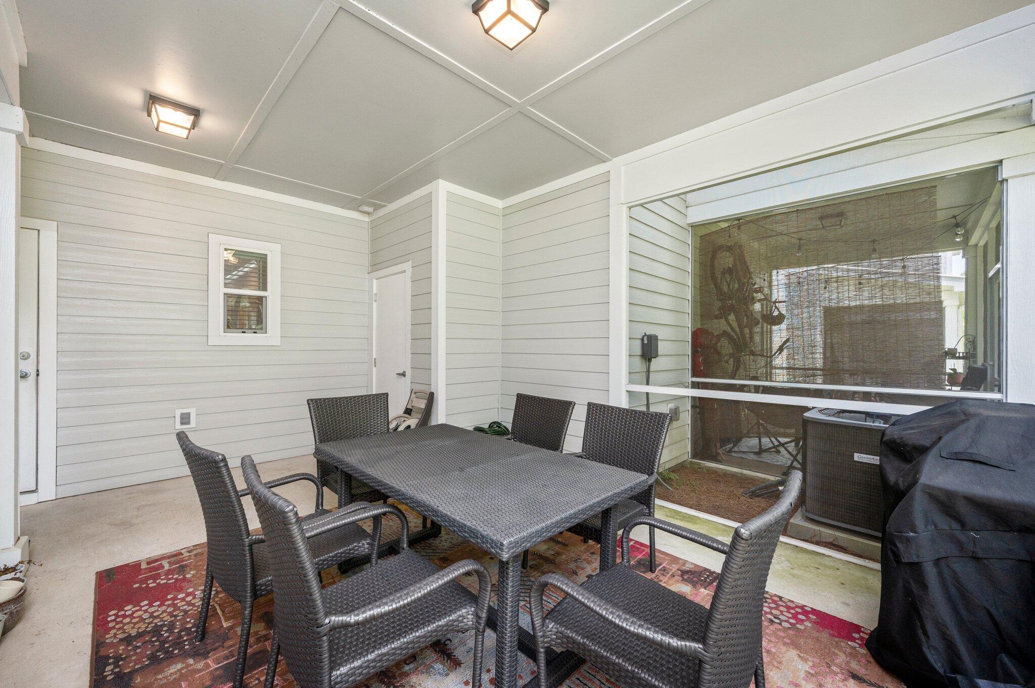 166 North Sand Palm Road Freeport, FL 32439 - Photo 5 of 22 a view of a dining room with furniture