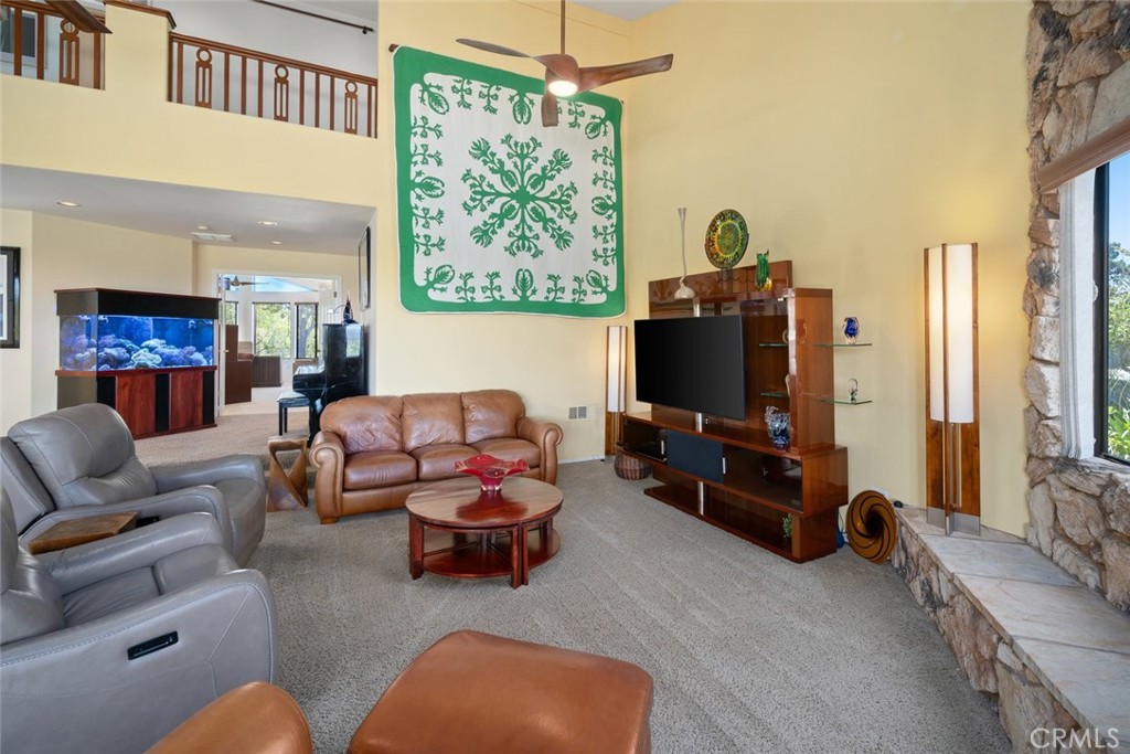 225 Broken Arrow Road Nipomo, CA 93444 - Photo 17 of 75 a living room with furniture and a flat screen tv
