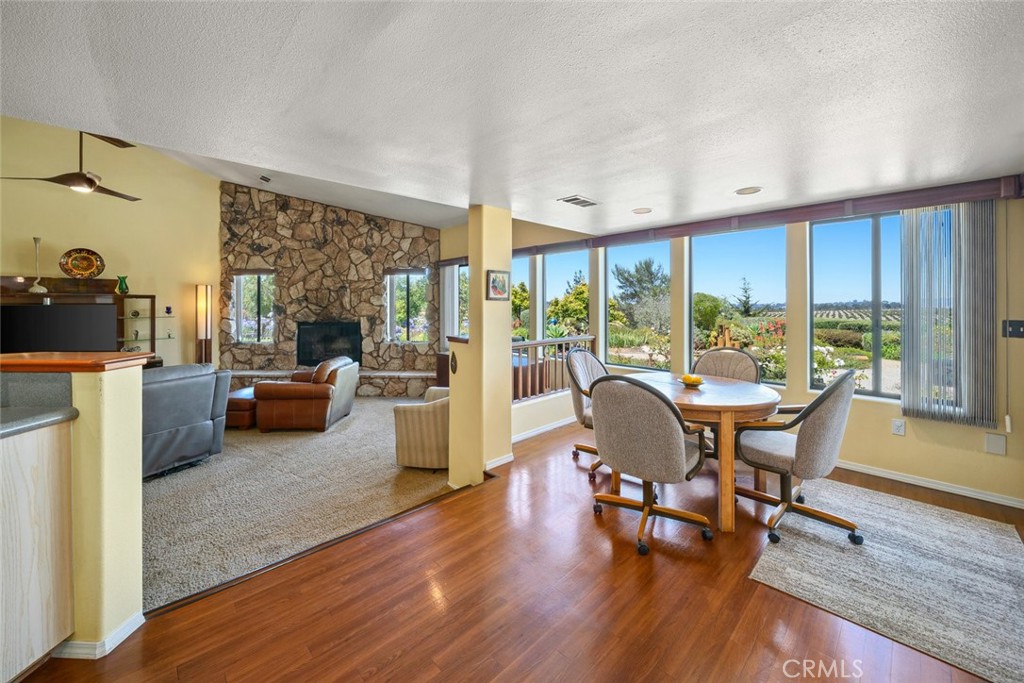 225 Broken Arrow Road Nipomo, CA 93444 - Photo 22 of 75 a dining room with furniture window and wooden floor